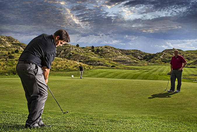 Men golfing at Bully Pulpit