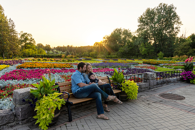 Couple sitting on a bench at International Peace Garden