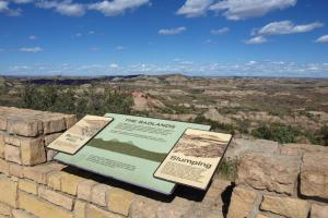 Interpretive panel in front of Painted Canyon scenic view