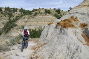 Biking on the Maah Daah Hey Trail near Medora