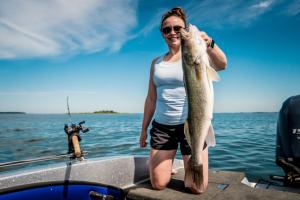 Woman displays her catch on Devils Lake