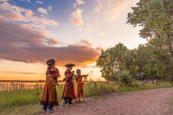 "Graciously Guided: A Living History Lesson" by Wendy Fix shows children in costume at Fort Mandan