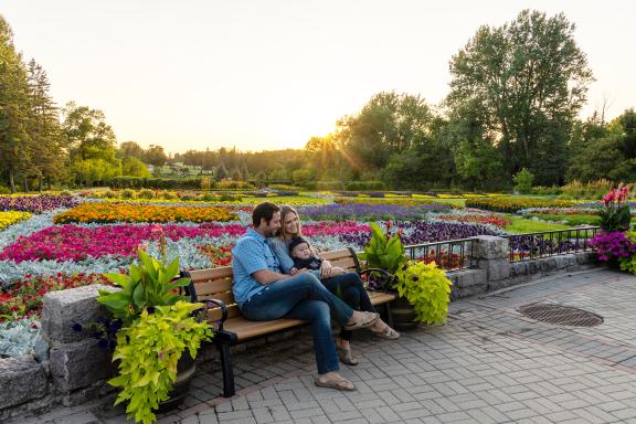 family sitting at the International peace garden