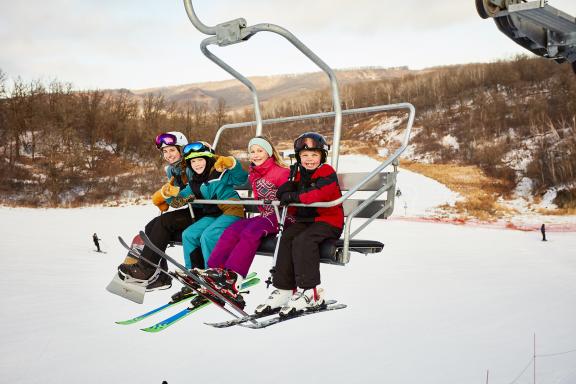 riding the ski lift