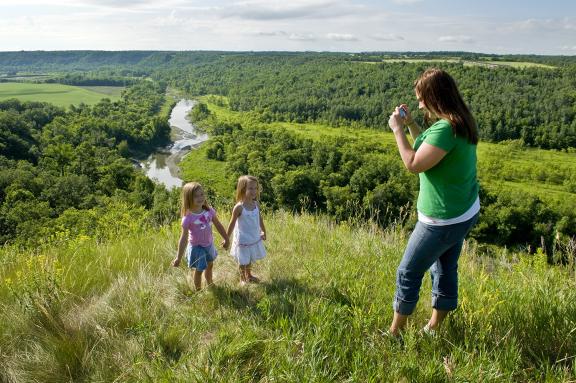 family taking pictures by the gorge