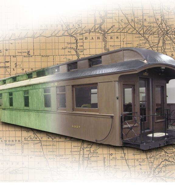 A vintage train car with a historical map in the background