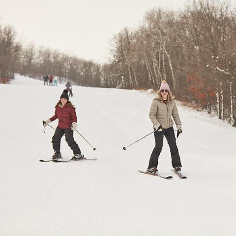 Girls downhill skiing