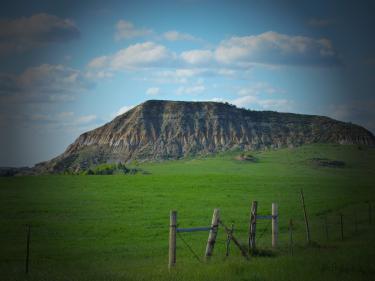 Lone Butte - the view you will see as you drive into the ranch.