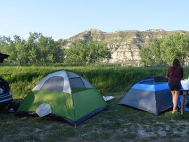 Primitive tents and RVs are equally welcome at the Medora Campground.