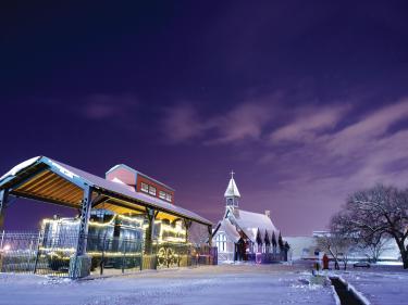 camp hancock state historic site is home to a 1909 steam locomotive and the 1881 bread of life church. photo
