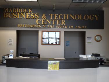 Entrance to the Business and Technology Center where offices and Suites retreat lodging rooms are located.