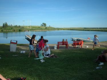 children enjoy mcville dam photo