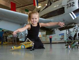 A child plays with planes at the Fargo Air Museum