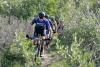 mountain bikers racing through tight & twisty at harmon lake photo 3